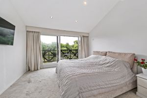 Bedroom One- click for photo gallery